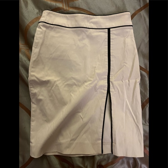 bebe Dresses & Skirts - Bébé tan skirt with front slit